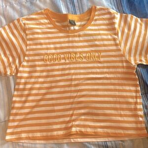 Bright yellow and white crop top